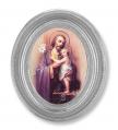  ST. JOSEPH GOLD STAMPED PRINT IN OVAL SILVER LEAF FRAME 